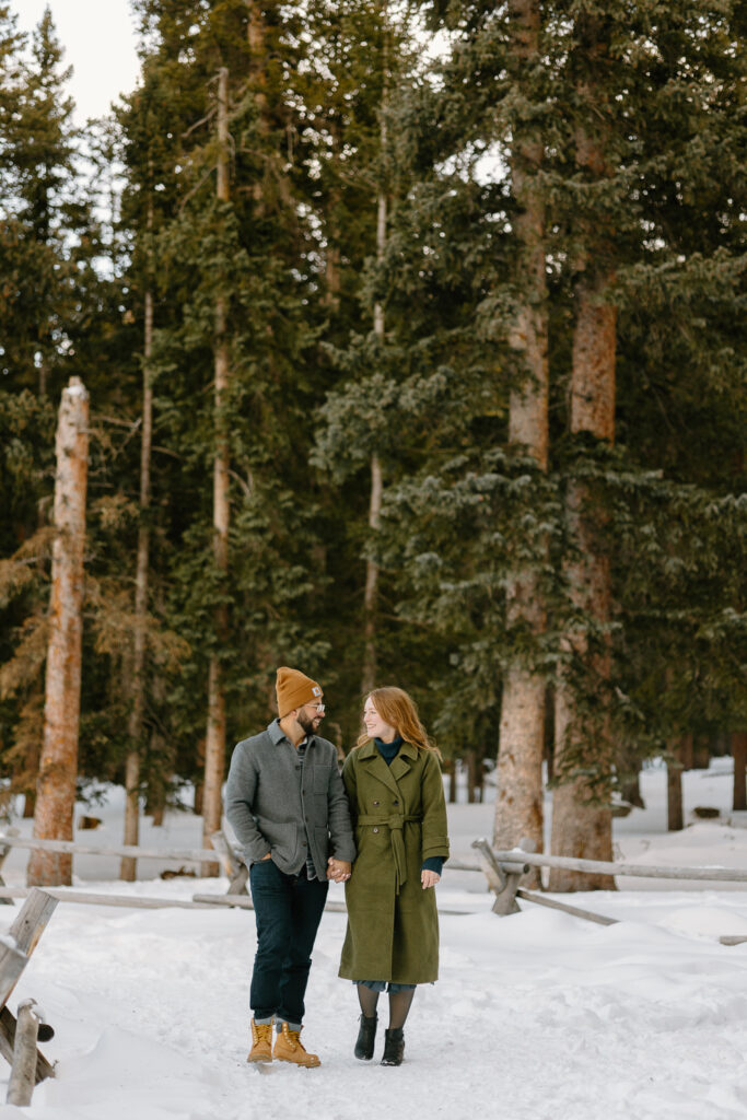 A young couple walks along a trail at Echo Lake.