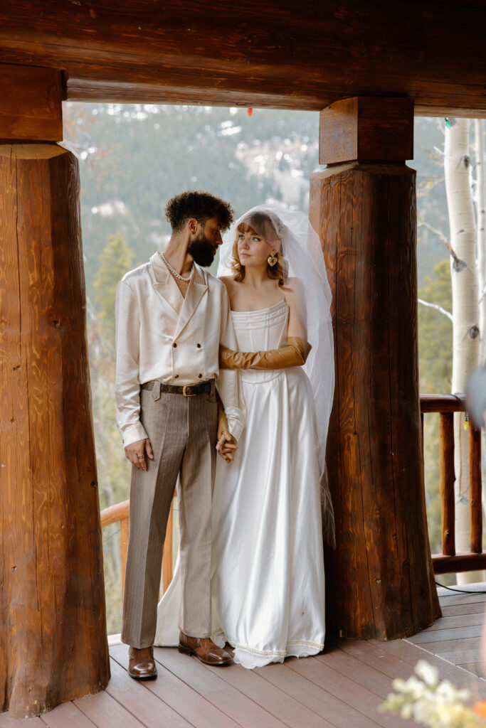 Colorado elopement couple sharing a loving smile as they gaze into each other’s eyes.
