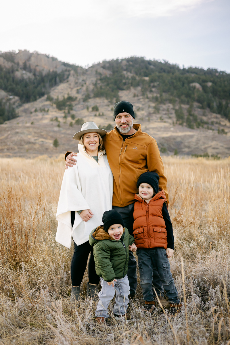 A family of four poses for a photo in Fort Collins, Colorado.